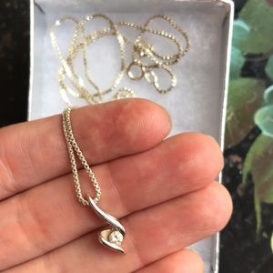 Sterling silver necklace with real diamond.